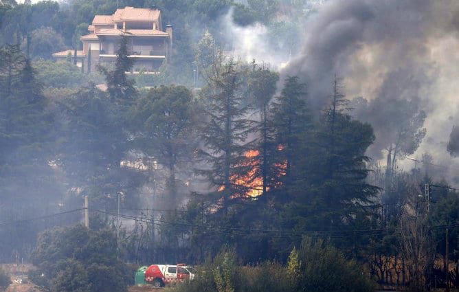 Imágenes del incendio en Robledo de Chavela. Foto: EFE