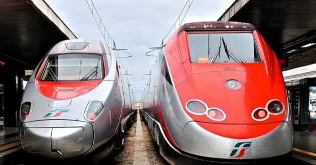 Frecciargento and Frecciarossa high-speed trains at Roma Termini (CC BY NC SA) DARKROOM DAZE-Flickr. Image cropped.