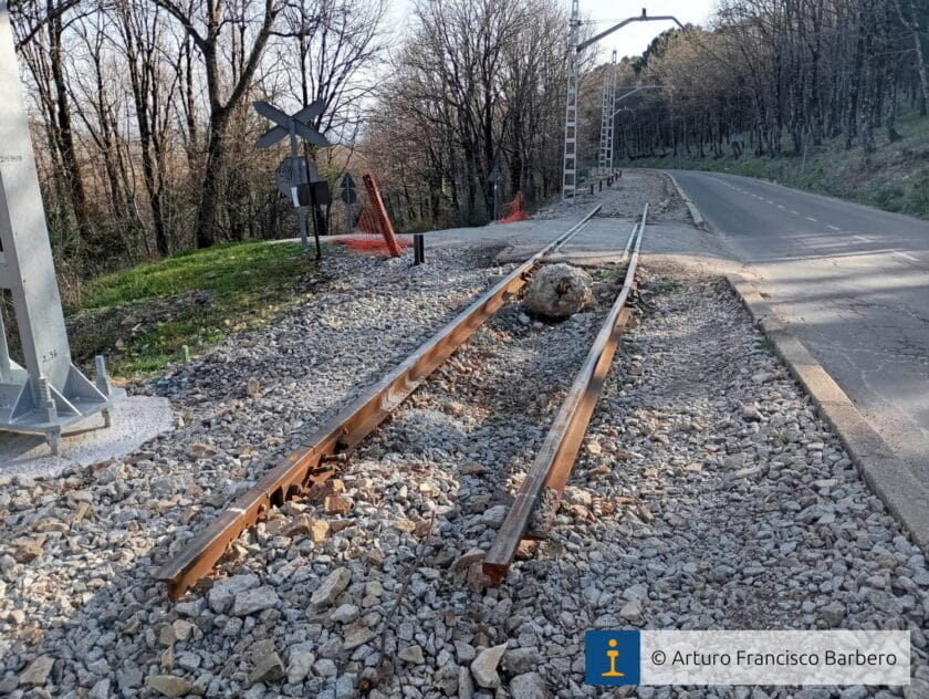 Section of old track at a level crossing.