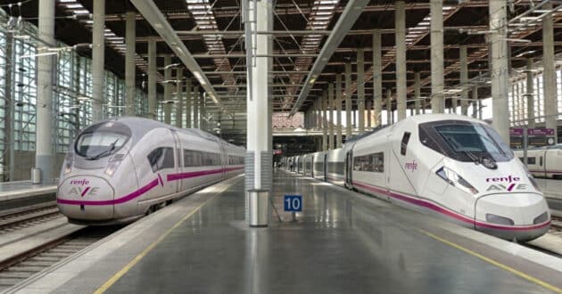 An AI-generated image of a Siemens Velaro MS and a Hitachi ETR 1000 in Renfe AVE colours at Madrid-Puerta de Atocha. GEMINI/Miguel Bustos.